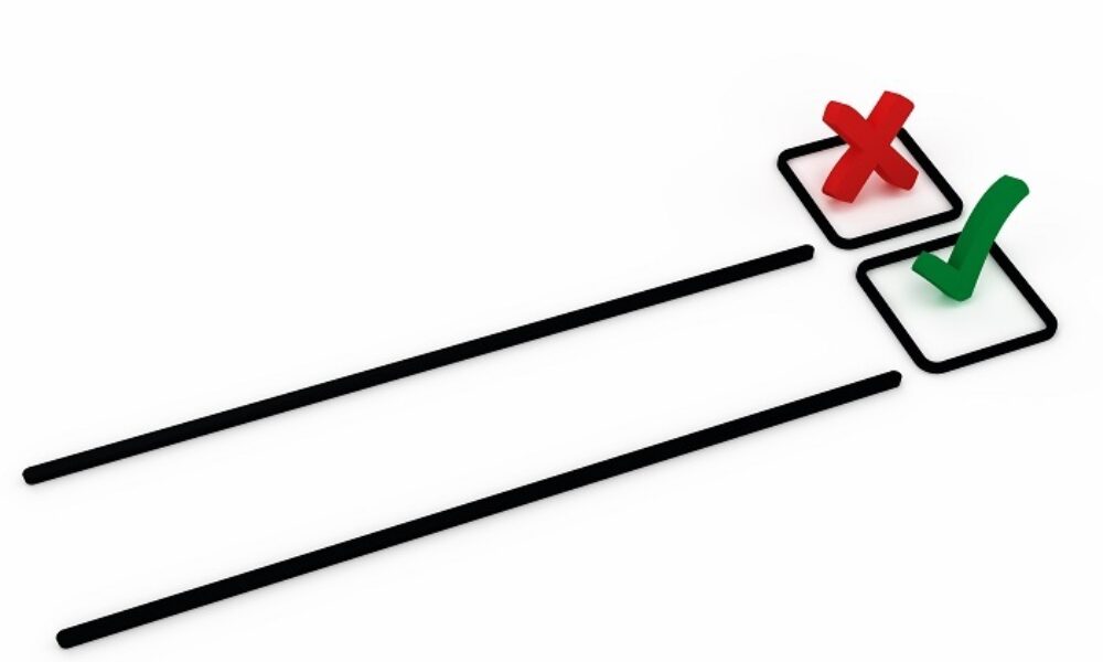 An illustration of a cross and a tick